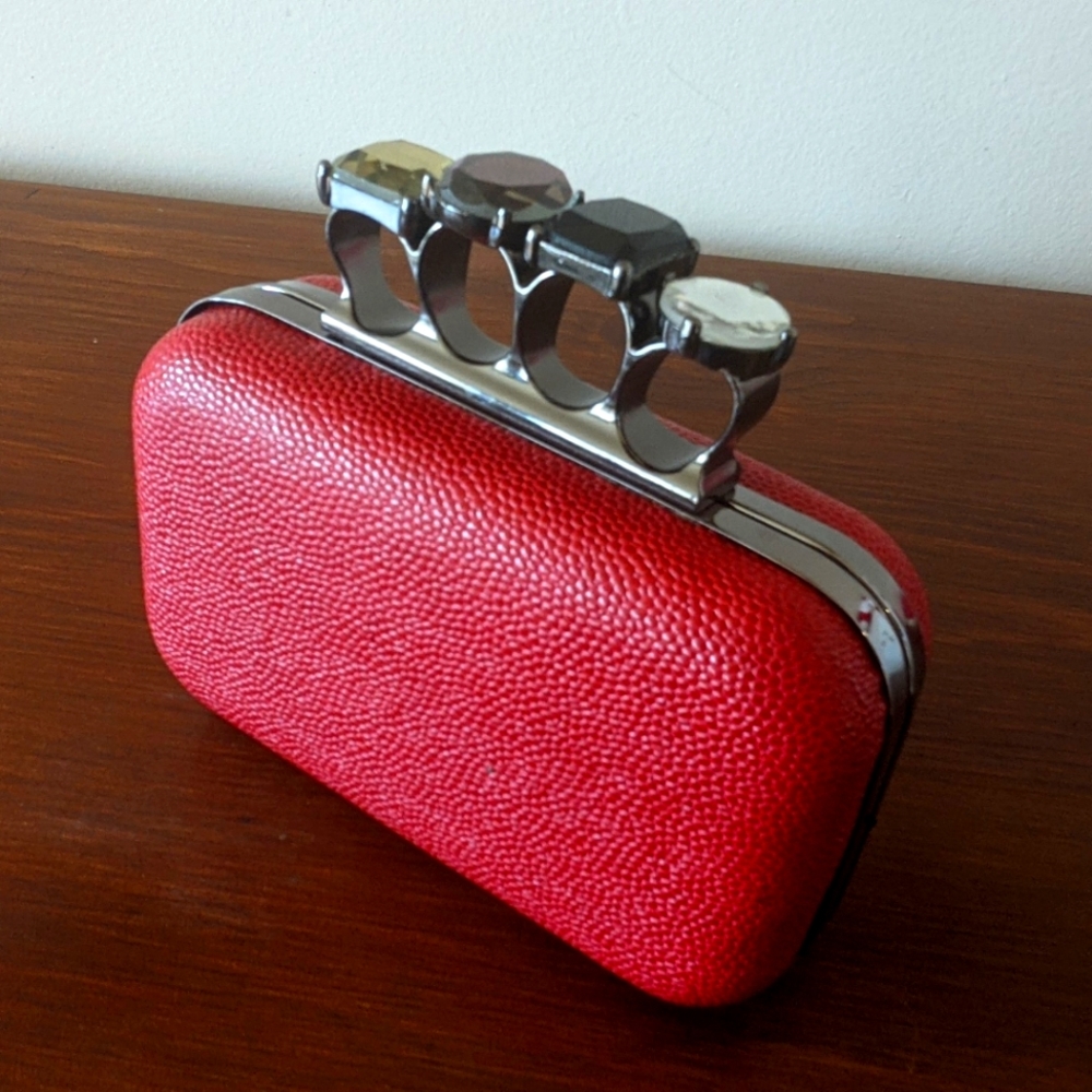 Chic Red Clutch with Metallic Accents